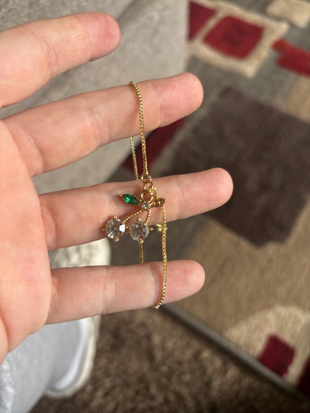 Gold-Tone Cherry Bracelet with Green Accent